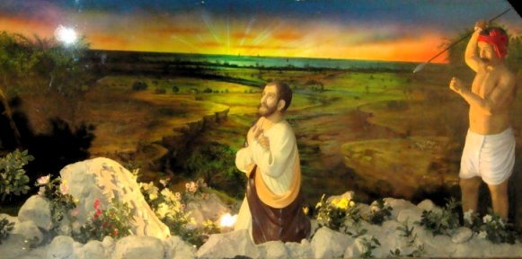 Tableau of St. Thomas and his Hindu assassin in San Thome Cathedral, Chennai, India. Tableau of St. Thomas and his Hindu assassin in San Thome Cathedral, Chennai, India.