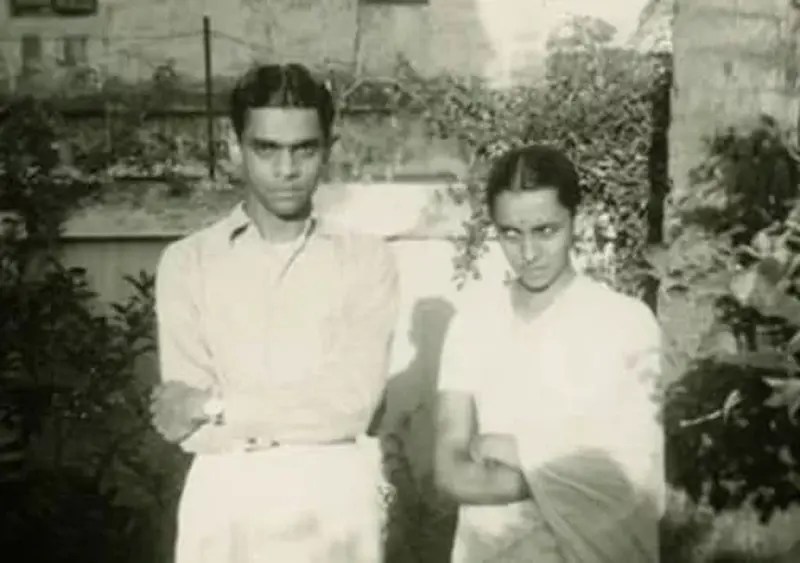 A young Ramanujan with his wife Janaki Ammal.